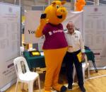 Mike Foley with Community Bank Piggy at Seniors Expo