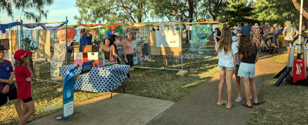 Visitors admiring the art at the 2025 Jetty Artspace